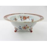 A 19th century English footed bowl, decorated in c