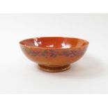 A Ruskin orange lustre art pottery bowl, with a sc