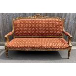 A 19th century gild wood sofa, the top rail and ar