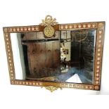 A 20th century mahogany mirror, the border set wit