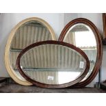 3 oval framed wall mirrors