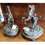 Pair of Spelter figures of horses and men