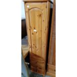 Tall,slim pine wardrobe