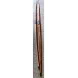 2 Yew wood longbows marked Eaton along with 2 leat