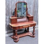 A 20th century mahogany dressing table with a