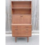 A mid century teak bookcase bureau, with a drop do