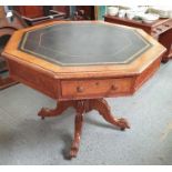 A 20th century oak octagonal occasional table, set