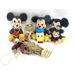 A collection of vintage soft toys including Disney