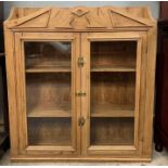 A Victorian pine two door cupboard, with two