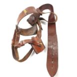 A 20th century brown leather belt and holster, wit