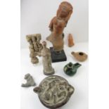 A collection of archaeological artifacts, largely