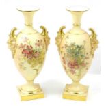 A pair of Royal Worcester blush ivory urn vases, e