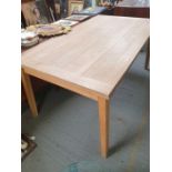 A Habitat extending oak dining table, 76cm high, 1