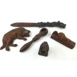 A collection of carved wooden items to include a p