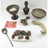 A collection of archaeological artifacts, to inclu