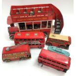A collection of five tin plate toy buses to
