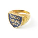 A 9ct gold signet ring, the shield shaped head dec