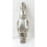 A silver figure in the form of Peter Rabbit, proba