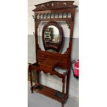 A early 20th century mahogany hall stand, with a h