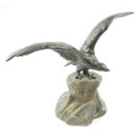 A 20th century bronze sculpture of a an eagle with