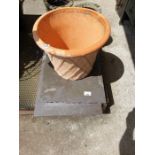 Large terracotta plant pot along with 2 slabs of W