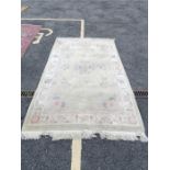 Floral patterned rug, 2m 59cm x 1m 53cm