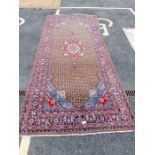 Red, green and blue patterned rug, 3m 43cm x 1m 46