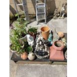 Quantity of glazed pots and various garden ornamen