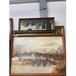 Shelf of framed paintings
