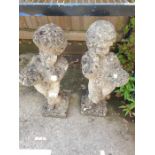 2 reconstituted stone garden figures of a boy & gi
