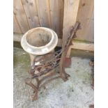 Pair of cast bench ends & a chimney planter