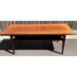 A mid century rosewood coffee table, with single s
