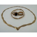 A 9ct gold flat snake necklace and bracelet; a 9ct