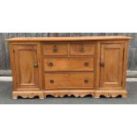 A Victorian pine sideboard with with two single cu