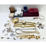 A silver charm bracelet and charms; a continental