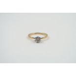 A single stone diamond ring, marked '18ct', the ro