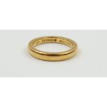 A 22ct gold wedding band, 2.9mm wide, finger size