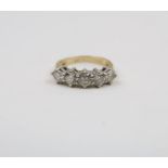 WITHDRAWN A five stone diamond ring, the band marked '585',