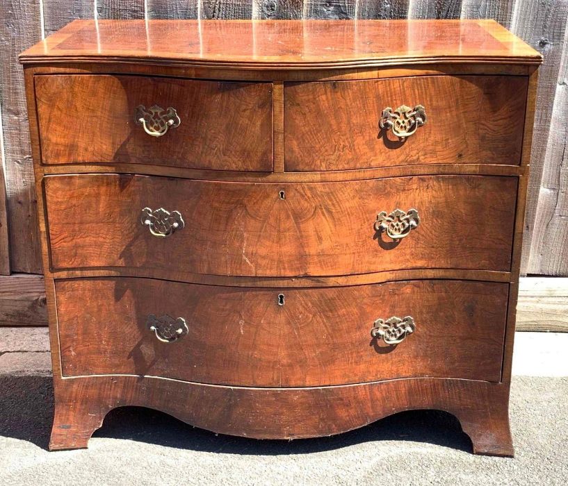A 20th century walnut chest of two s