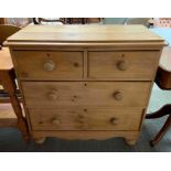 A Victorian pine chest of drawers, of two long and