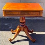 A Victorian mahogany side table with a single long