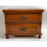A 20th century table top two drawer cabinet, 29cm