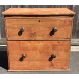A Victorian pine chest of two long drawers