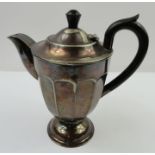 A 1930's silver plated hot water pot, with ebonise