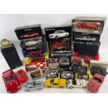 A collection of model/toy cars including Burago, G