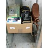 Collection of vintage cameras and related items