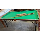 Billiards table with scoreboard and 3 cues