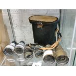 3 Sets of vintage binoculars and a binocular case