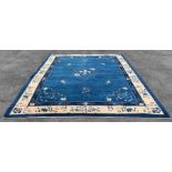 Large blue and cream Oriental style rug, 361cm x 2