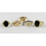 Four 9ct gold signet rings, two set with blood sto